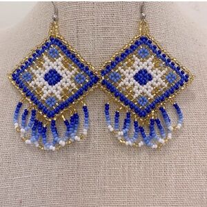 Beautiful handmade chakira bead rhombus shaped earrings.